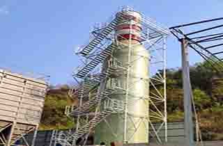 Chemical plant structure with FRP access platforms and safety barrier systems.